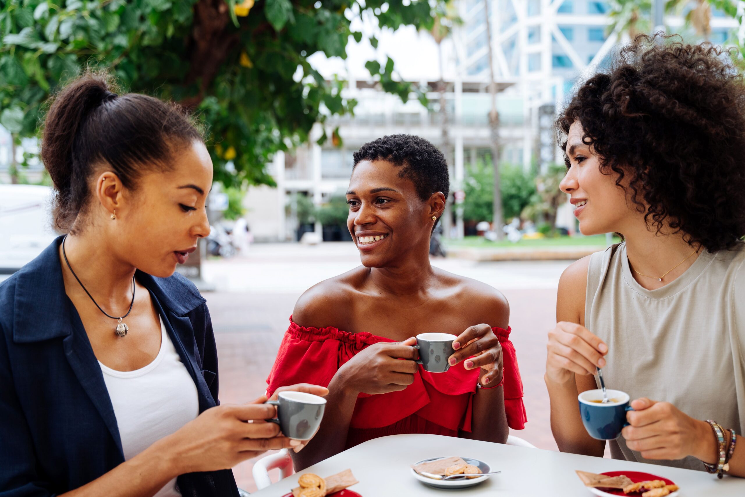 three-mixed-race-hispanic-and-black-women-bonding-2025-03-18-13-58-14-utc